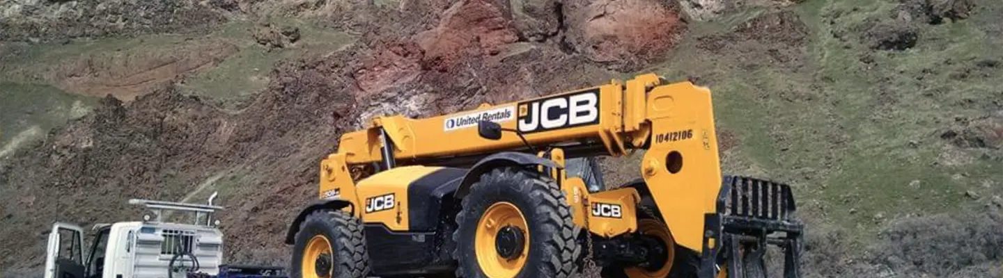 Forklift in front of the mountains