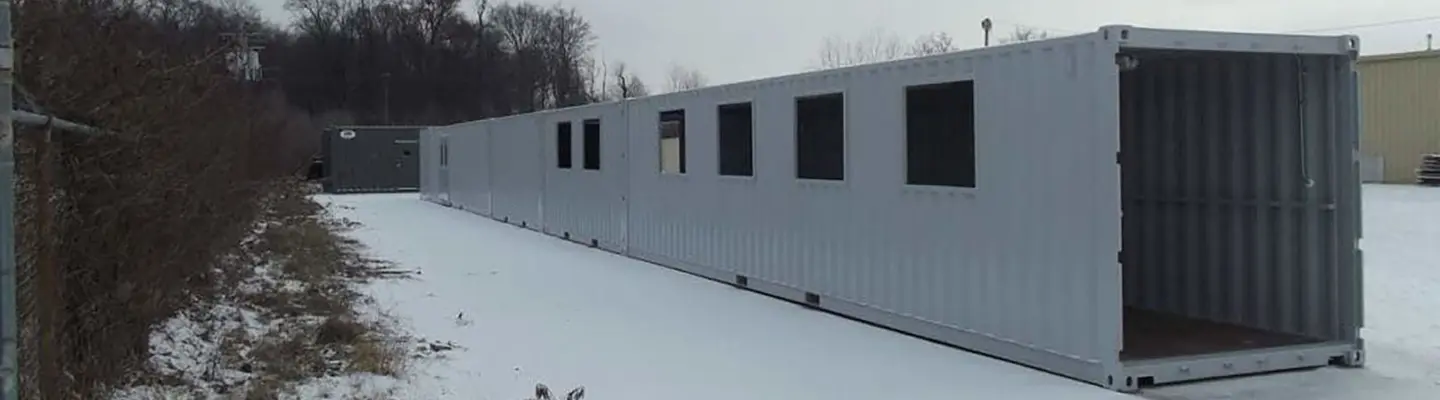 Container covered walkway in snow