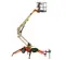 Front angled view of an orange and beige telescopic boom lift with stabilizers and an extended arm with a basket.