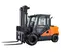 Side view of an orange and black Doosan warehouse forklift with an enclosed cabin and extended forks.