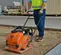 Orange Multiquip Mikasa vibratory plate compactor