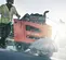 Orange and gray Husqvarna Self-propelled Walk-behind Concrete Saw