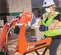 Orange and silver and beige NORTON Masonry or Tile Saw, 14 in., Gas or Electric Powered