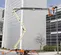 Beige and orange JLG Boom