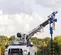 White Elliott 47 ft. Digger Derrick Truck