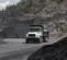 White and Black Freightliner Dump Truck