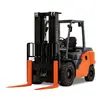 Front angled view of an orange and black Toyota warehouse forklift with a black mast, orange forks and an open cabin.
