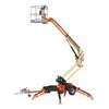 Beige and orange JLG electric towable boom lift