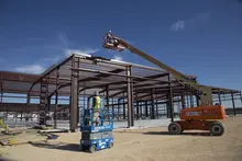 Workers on lifts