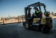Worker on forklift