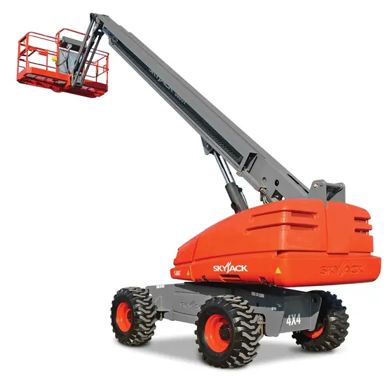 Rear angled view of orange and gray Skyjack boom lift with extended arm and basket.